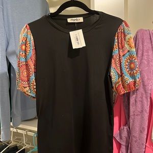 New Haptics black top with printed sleeves size medium